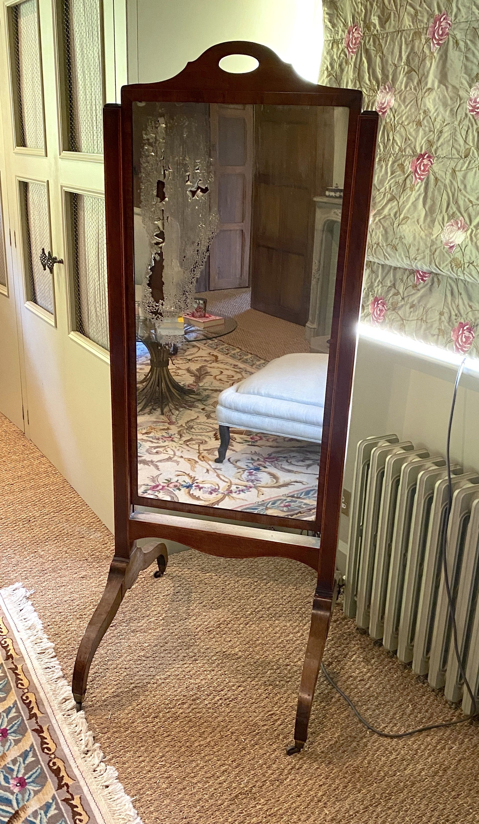 A Regency strung mahogany cheval mirror, with height adjustable plate, width 63cm height 159cm